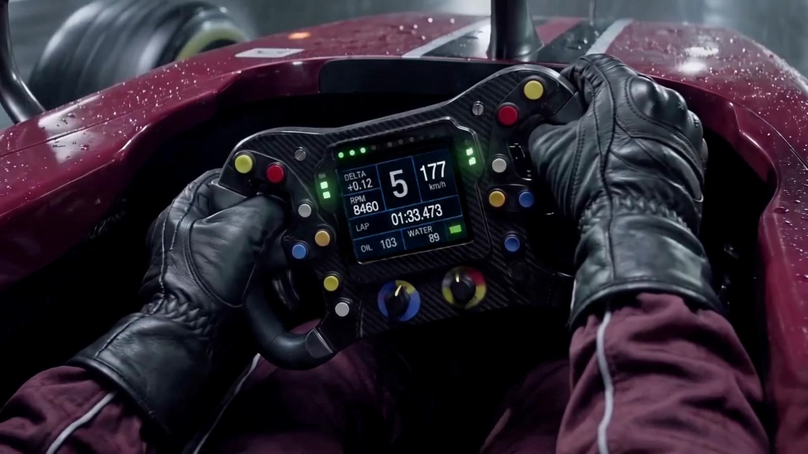 Gloved hands on a racing wheel with a lit dashboard